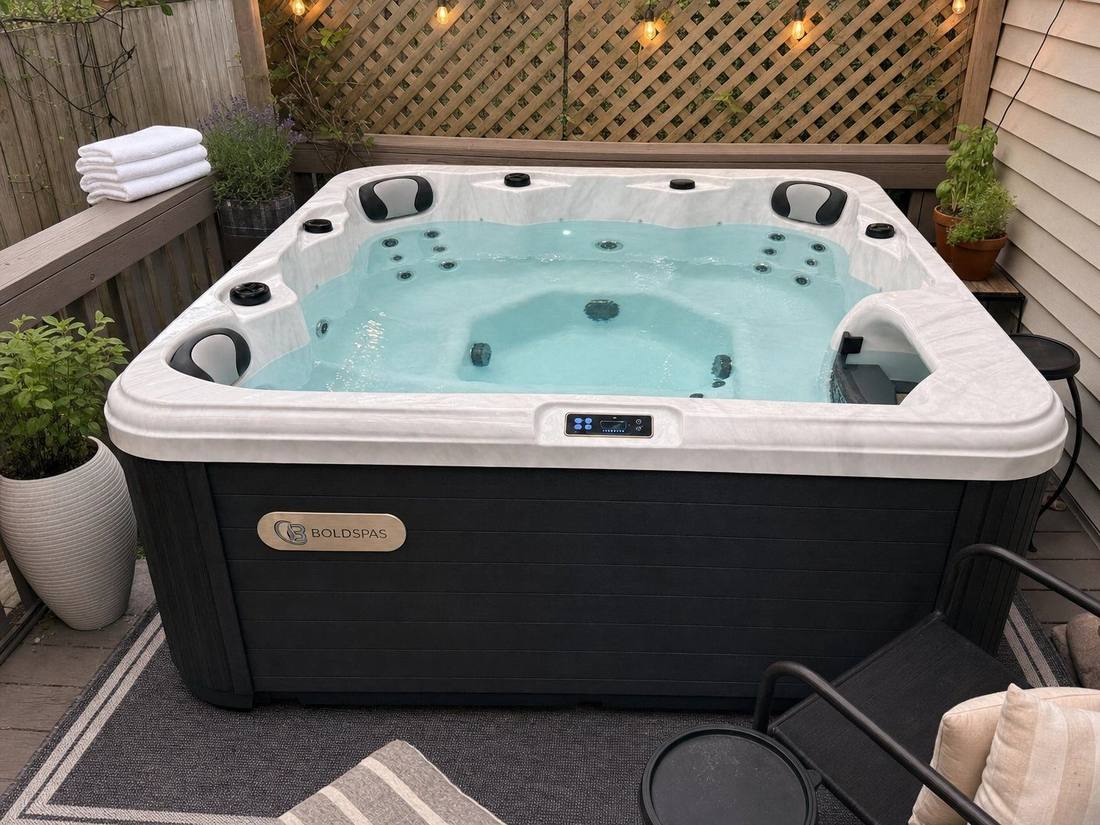 Compact hot tub on a townhome deck